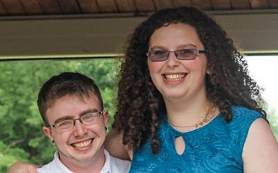 Dane Kutler and Rowan Parker celebrating at one of their 10 wedding ceremonies in 2013. (photo credit: JTA)