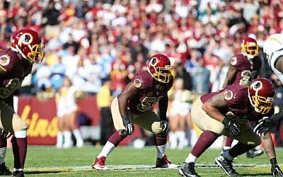 London Fletcher at middle linebacker for the Washington Redskins, for whom he played seven of his 16 NFL seasons. (photo credit: Courtesy Washington Redskins)