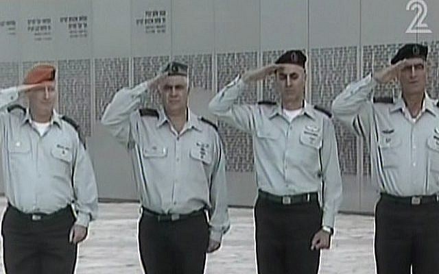 IDF major generals salute the casket of former premier Ariel Sharon, January 13, 2014. (photo credit: screen shot/Channel 2)
