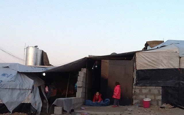 Children play in a refugee camp for Syrian Kurds in Iraqi Kurdistan (photo credit: Times of Israel/Lazar Berman)