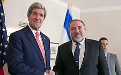 Israeli Foreign Minister Avigdor Liberman (right) and US Secretary of State John Kerry during a meeting in Jerusalem, January 3, 2014 (photo credit: AP)