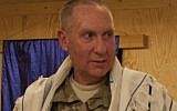 Army Chaplain (Lt. Col.) Avi Weiss wears a prayer shawl during Shabbat at Camp Leatherneck, Afghanistan, in 2012 (photo credit: Sgt. Christine Samples/Army/US Department of Defense)