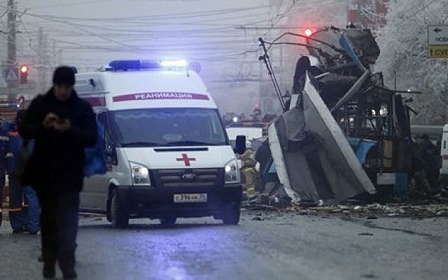 An ambulance leaves the site of an explosion after a bomb blast tore through the trolley. (photo credit: AP Photo/Denis Tyrin, File) An ambulance leaves the site of an explosion after a bomb blast tore through the trolley. (photo credit: AP Photo/Denis Tyrin, File)