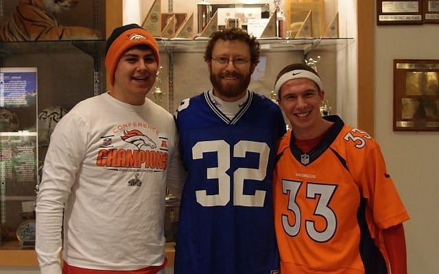 Denver Academy of Torah teacher Benjamin Levy, center, is rooting hard for his hometown Seattle Seahawks, but is mindful of his students' passion for their native Denver Broncos. (Courtesy Benjamin Levy)