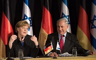 German Chancellor Angela Merkel and Prime Minister Benjamin Netanyahu attend a joint press conference at the King David hotel in Jerusalem on February 25, 2014 (AFP/Menahem Kahana)
