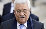 Palestinian Authority President Mahmoud Abbas arrrives at the Elysee Palace in Paris on February 21, 2014. (photo credit: Alain Jocard/AFP)
