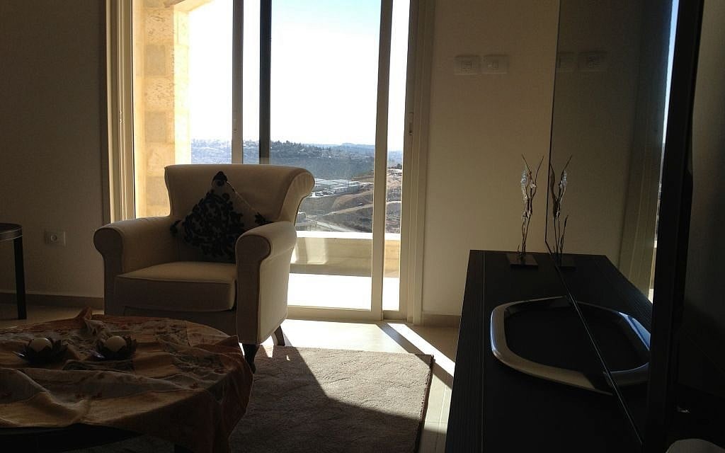 The living room in Rawabi's model apartment (photo credit: Elhanan Miller/Times of Israel)