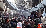 Palestinians are evacuated from the Yarmouk refugee camp in Damascus, Syria, on February 2, 2014. (UNRWA/AFP)