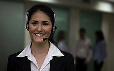 Customer service agent. She's smiling, but what about the customer? (Photo credit: Courtesy)