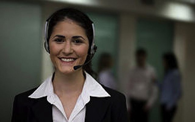 Customer service agent. She's smiling, but what about the customer? (Photo credit: Courtesy) Customer service agent. She's smiling, but what about the customer? (Photo credit: Courtesy)