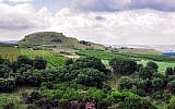 The tell of Abel Beth Maacah from the northwest, with the Golan Heights in the background. (photo credit: Ferrell Jenkins)