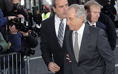Bernard Madoff arrives at Manhattan federal court, Thursday, March 12, 2009, in New York. (photo credit: AP Photo/ Louis Lanzano)