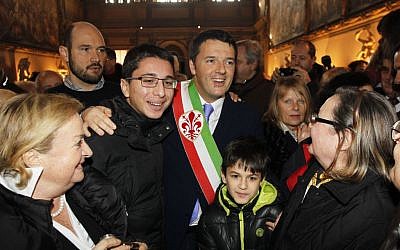 Florence mayor Matteo Renzi greets couples that have been married for over 50 years during a ceremony on Valentine's Day in Florence, Italy, Friday, Feb. 14, 2014.  (photo credit: AP Photo/Fabrizio Giovannozzi)