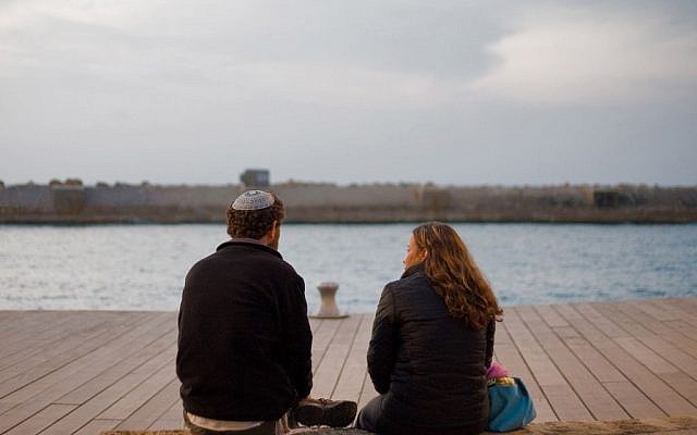 A Modern Orthodox couple with a sea view (Illustrative photo credit: Dima Vazinovich/Flash90)