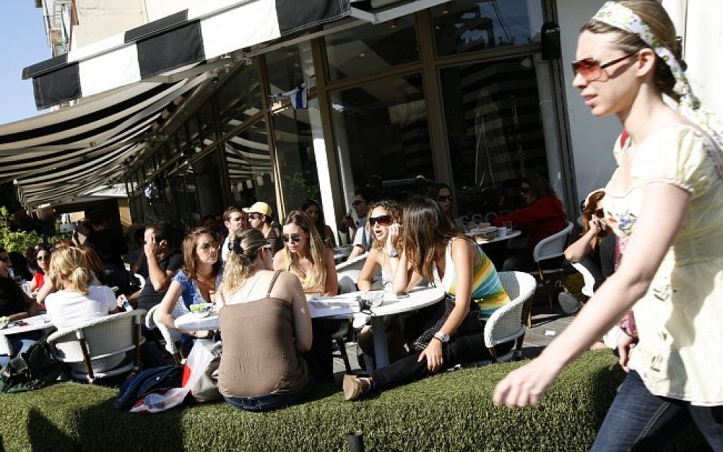 Illustrative photo of young Israelis at a cafe in Tel Aviv (photo credit: Miriam Alster/Flash90) Illustrative photo of young Israelis at a cafe in Tel Aviv (photo credit: Miriam Alster/Flash90)