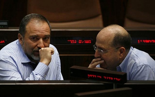 Foreign Minister Avigdor Liberman speaks with Defense Minister Moshe Ya'alon during a session in the Knesset, June 2009 (photo credit: Miriam Alster/Flash90) Foreign Minister Avigdor Liberman speaks with Defense Minister Moshe Ya'alon during a session in the Knesset, June 2009 (photo credit: Miriam Alster/Flash90)