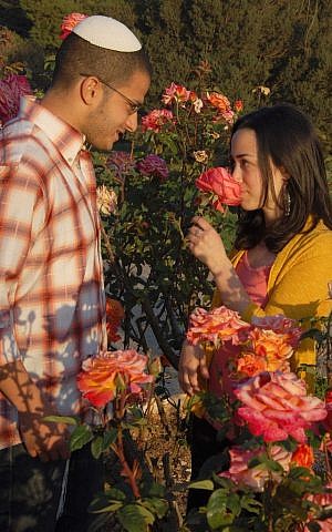 A couple in Jerusalem's rose garden. (Illustrative photo: Rachael Cerrotti/Flash90)