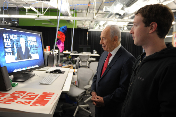 President Shimon Peres with Facebook founder Mark Zuckerberg in March 2012 (photo credit: Moshe Milner/ GPO/ Flash 90)