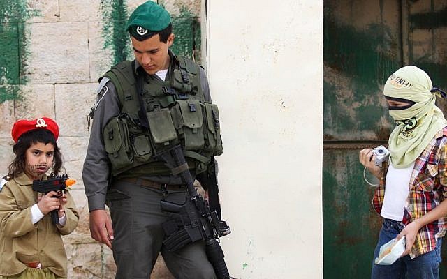 An Israeli child dressed as an IDF soldier on the Jewish holiday of Purim (photo credit: Nati Shohat/Flash90) An Israeli child dressed as an IDF soldier on the Jewish holiday of Purim (photo credit: Nati Shohat/Flash90)