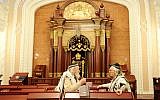 Illustrative photo of Jewish men inside a synagogue in Kiev (Mendy Hechtman/Flash90)