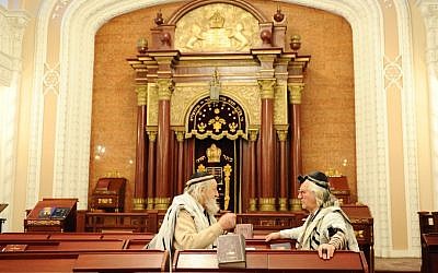 Illustrative photo of Jewish men inside a synagogue in Kiev (Mendy Hechtman/Flash90)