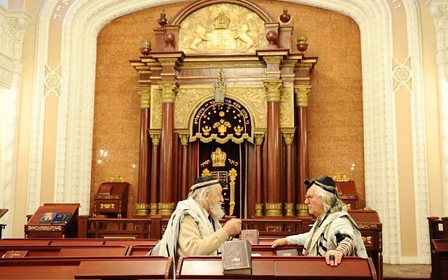 Illustrative photo of Jewish men inside a synagogue in Kiev (Mendy Hechtman/Flash90)