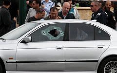 The car in which 27-year old Taher Lalah was shot to death by masked gunmen in central Tel Aviv (photo credit: Roni Schutzer/Flash90)