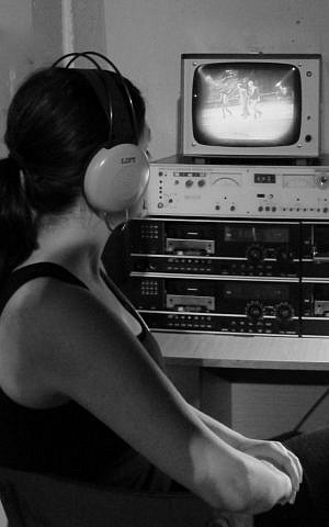 Antopol, a self-described 'history nerd' doing research on surveillance under Communism at the DDR Museum for her story on a Czech dissident. (photo credit: Chanan Tigay)