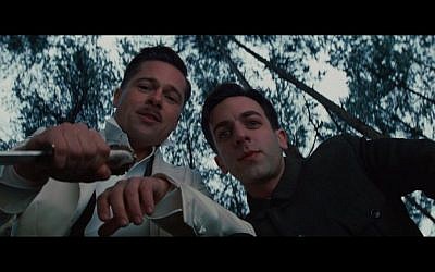 Brad Pitt, left, and B.J. Novak in “Inglourious Basterds.” Pitt plays a non-Jewish American soldier who leads a group of Jewish soldiers that hunt down Nazis during World War II (photo credit: Courtesy)