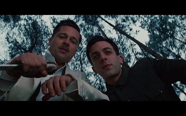 Brad Pitt, left, and B.J. Novak in “Inglourious Basterds.” Pitt plays a non-Jewish American soldier who leads a group of Jewish soldiers that hunt down Nazis during World War II (photo credit: Courtesy)