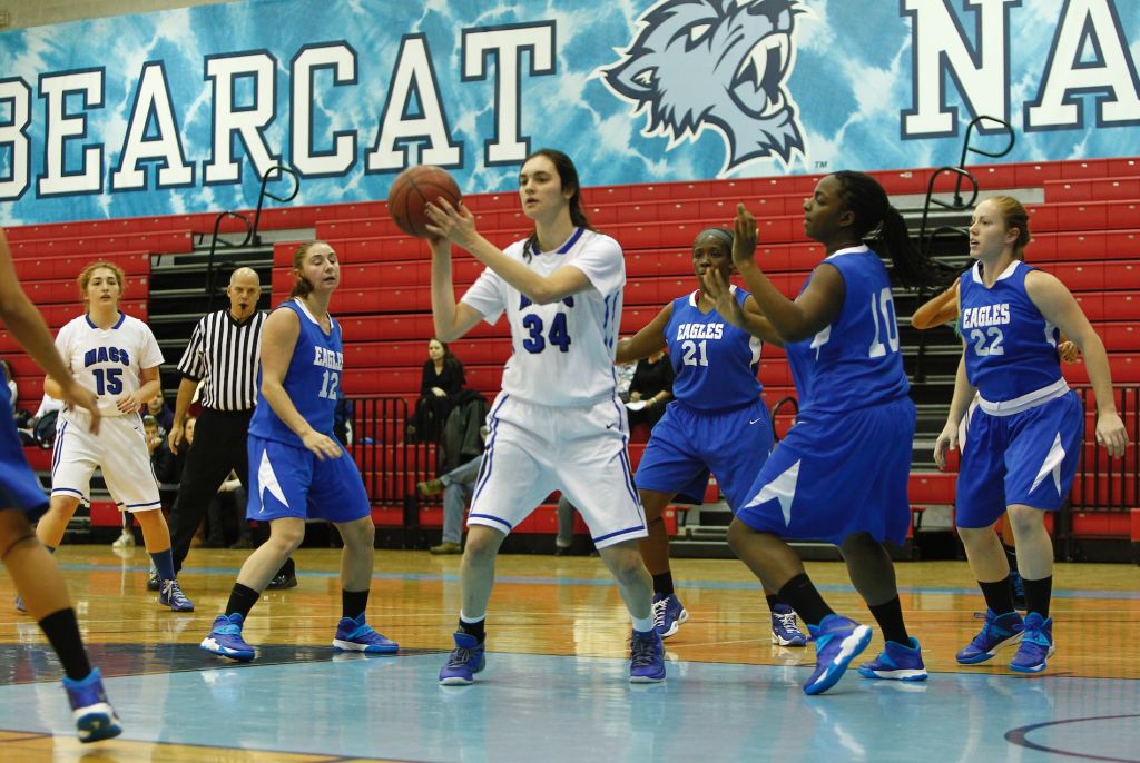 In this Nov. 24, 2013 loss to the College of Elizabeth, Yeshiva University Maccabees forward Rebecca Yoshor, No. 34, grabbed 22 rebounds, a category in which she leads the nation. (Courtesy of Yeshiva University Sports Information Office/JTA) Yeshiva University's female basketball team, the Maccabees, in 2013. (Courtesy of Yeshiva University Sports Information Office/JTA)