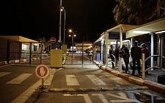 Foreigners wait to cross to Egypt at the Israeli side of the Taba crossing near the Red Sea resort of Eilat, Sunday, Feb 16, 2014. (photo credit: AP Photo/Tsafrir Abayov)