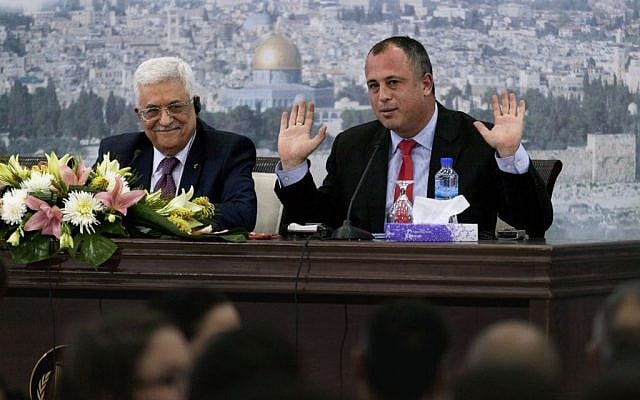 Mahmoud Abbas (l) and MK Hilik Bar at the Muqataa in Ramallah, February 16, 2014 (photo credit: AP/Nasser Nasser)