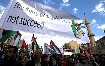 Illustrative photo of protesters affiliated with Jordan's Muslim Brotherhood chanting anti-Israel and anti-America slogans during a demonstration in downtown Amman, Jordan, February 2014. (photo credit: AP/Mohammad Hannon)