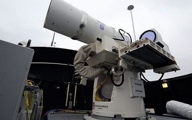 A laser weapon sits temporarily installed aboard the guided-missile destroyer USS Dewey in San Diego. The Navy plans to deploy its first laser on a ship in 2014, and intends to test an electromagnetic rail gun prototype aboard a vessel within the following two years. (photo credit: AP Photo/U.S. Navy, John F. Williams) A laser weapon sits temporarily installed aboard the guided-missile destroyer USS Dewey in San Diego. The Navy plans to deploy its first laser on a ship in 2014, and intends to test an electromagnetic rail gun prototype aboard a vessel within the following two years. (photo credit: AP Photo/U.S. Navy, John F. Williams)