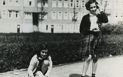 Anne Frank (L) plays with her friend Hanneli Goslar (R) on the Merwedeplein square in Amsterdam, May 1941. (AP Photo/Anne Frank House Amsterdam/Anne Frank Fonds Basel photo collections)
