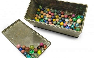 A set of marbles belonging to Anne Frank,  November 14, 2013 (photo credit: AP Photo/Anne Frank House Amsterdam, Diederik Schiebergen)