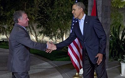 US President Barack Obama greets Jordan's King Abdullah II at The Annenberg Retreat at Sunnylands, Rancho Mirage, California, on Feb. 14, 2014. (photo credit: AP/Jacquelyn Martin)