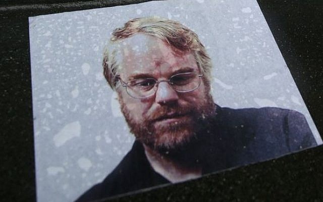 A makeshift memorial is seen, Monday, Feb. 3, 2014, outside the building where the body of actor Philip Seymour Hoffman was found in New York. Hoffman, 46, was found dead Sunday in his apartment. (AP Photo/Seth Wenig) A makeshift memorial is seen, Monday, Feb. 3, 2014, outside the building where the body of actor Philip Seymour Hoffman was found in New York. Hoffman, 46, was found dead Sunday in his apartment. (AP Photo/Seth Wenig)