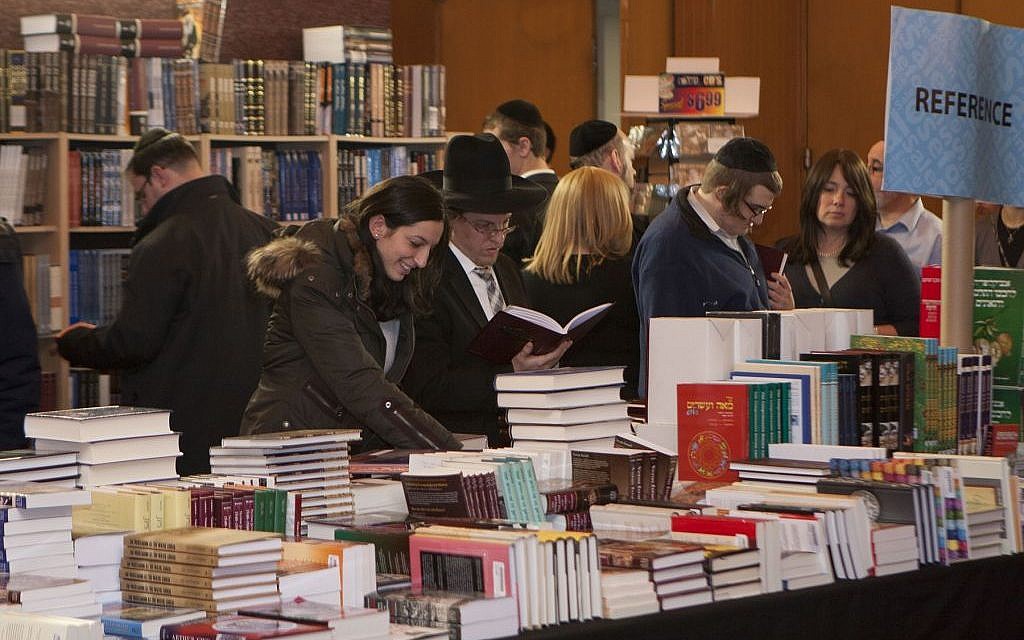 Visitors search for treasures at the Yeshiva University's annaul Seforim Sale. (courtesy) Visitors search for treasures at the Yeshiva University's annaul Seforim Sale. (courtesy)