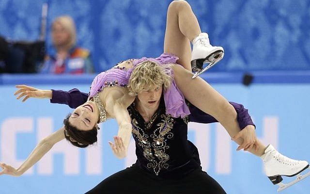 Meryl Davis and Charlie White of the United States compete in the ice dance free dance figure skating finals at the Iceberg Skating Palace in Sochi, Russia, on Monday (photo credit: AP/Darron Cummings) Meryl Davis and Charlie White of the United States compete in the ice dance free dance figure skating finals at the Iceberg Skating Palace in Sochi, Russia, on Monday (photo credit: AP/Darron Cummings)