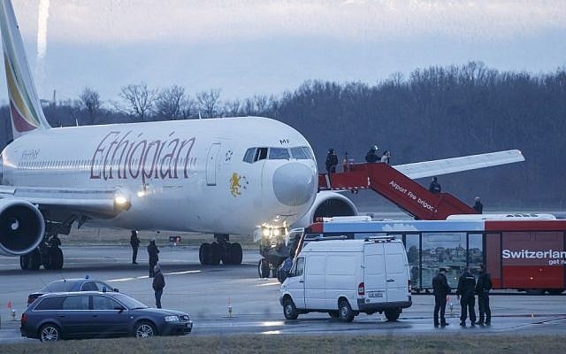 Passengers are evacuated from a hijacked Ethiopian Airlines plane at Geneva International Airport, in Switzerland on Monday (photo credit: AP/Keystone/ Salvatore Di Nolfi) Passengers are evacuated from a hijacked Ethiopian Airlines plane at Geneva International Airport, in Switzerland on Monday (photo credit: AP/Keystone/ Salvatore Di Nolfi)