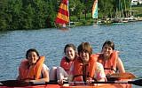 Illustrative photo of children with disabilities and their peers kayaking at the Conservative movement's Camp Ramah Wisconsin. (Courtesy National Ramah Commission/JTA)
