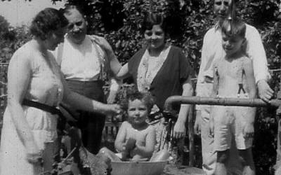 Relatives give little Bobby Schneider a bath in the Hungarian countryside c. 1940. (courtesy of Lynn Schneider)