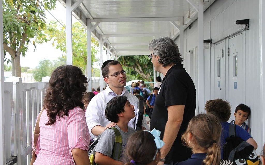The Ben Gamla Hebrew Charter School in Hollywood, Fla., seen here as a Jewish religious after-school program gets underway, is one sign of the growing presence of young Jewish families in South Florida. (Uriel Heilman/JTA) The Ben Gamla Hebrew Charter School in Hollywood, Fla., seen here as a Jewish religious after-school program gets underway, is one sign of the growing presence of young Jewish families in South Florida. (Uriel Heilman/JTA)