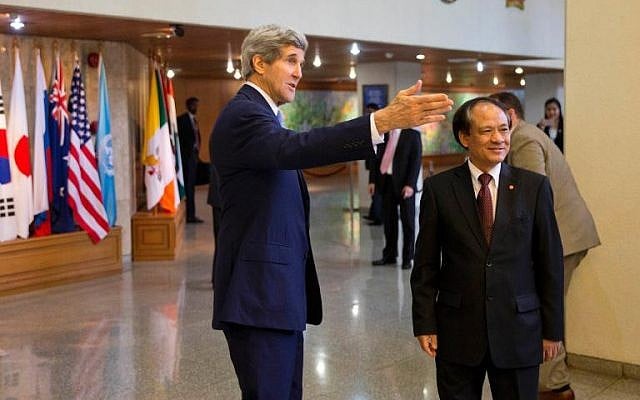 US Secretary of State John Kerry (L) introduces his staff before a meeting with ASEAN Secretary-General Le Luong Minh in Jakarta on Sunday, February 16, 2014 (photo credit: AFP/Evan Vucci) US Secretary of State John Kerry (L) introduces his staff before a meeting with ASEAN Secretary-General Le Luong Minh in Jakarta on Sunday, February 16, 2014 (photo credit: AFP/Evan Vucci)