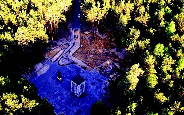 Aerial photo showing asphalt-paved square with two memorials, under which archeologists expect to find remnants of the gas chambers (photo courtesy: Wojtek Mazurek) Aerial photo showing asphalt-paved square with two memorials, under which archeologists expect to find remnants of the gas chambers (photo courtesy: Wojtek Mazurek)