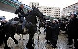 Hundreds of ultra-Orthodox clash with Israeli police during a protest in Jerusalem on February 6, 2014, following the arrest of a Haredi draft-dodger. (photo credit: Yonatan Sindel/Flash90)