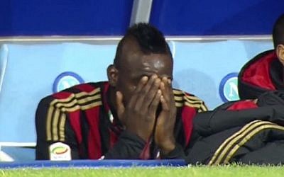 Mario Balotelli cries on AC Milan's bench, Saturday, February 9, 2014 (screen capture: YouTube)