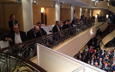 Iranian officials, left, sitting next to Israeli officials, as Iranian FM Zarif addresses the Munich Security Conference, February 2, 2013 (photo credit: Raphael Ahren/TOI)